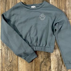 Smiley-face cropped sweatshirt